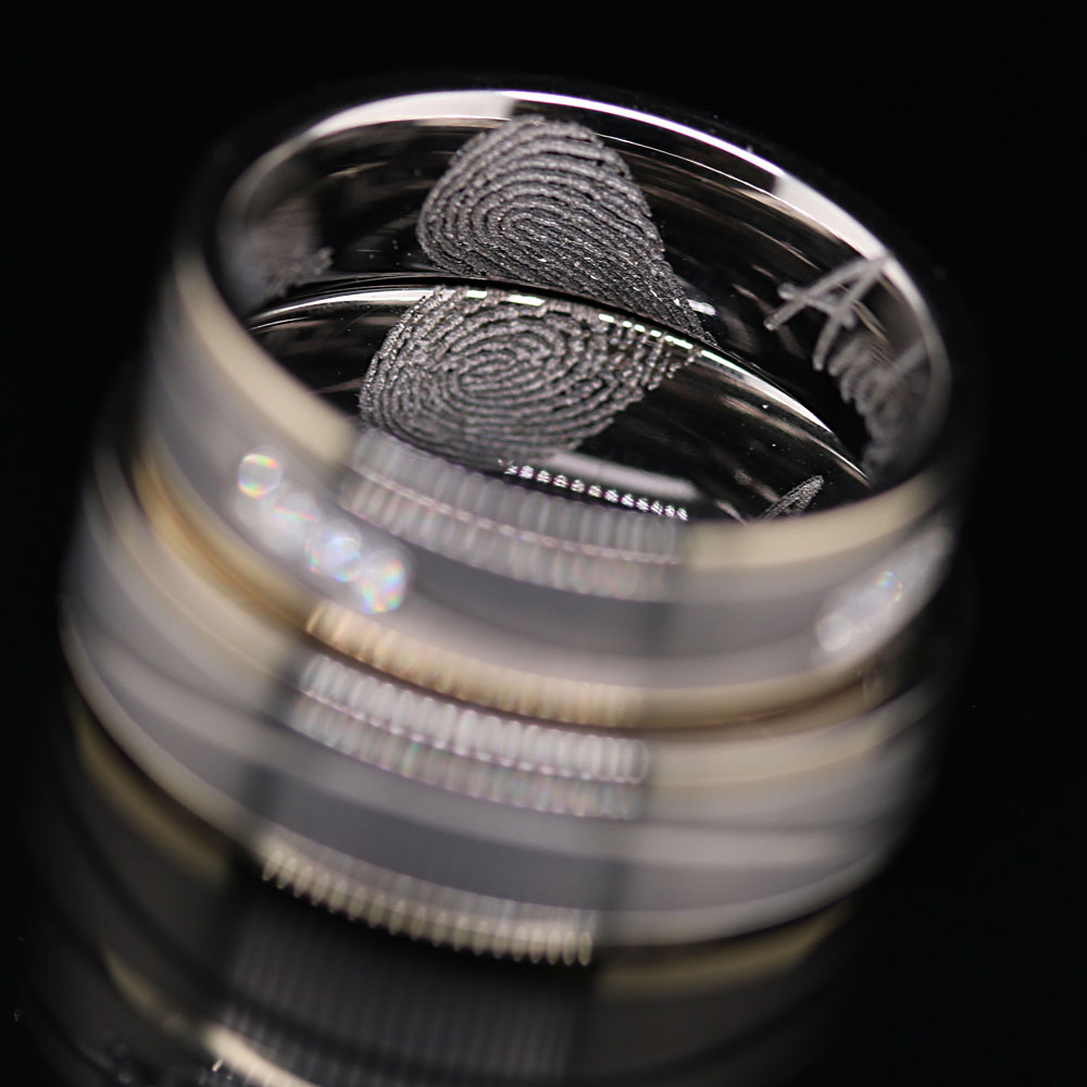 Ringe mit herzförmiger Fingerprintgravur